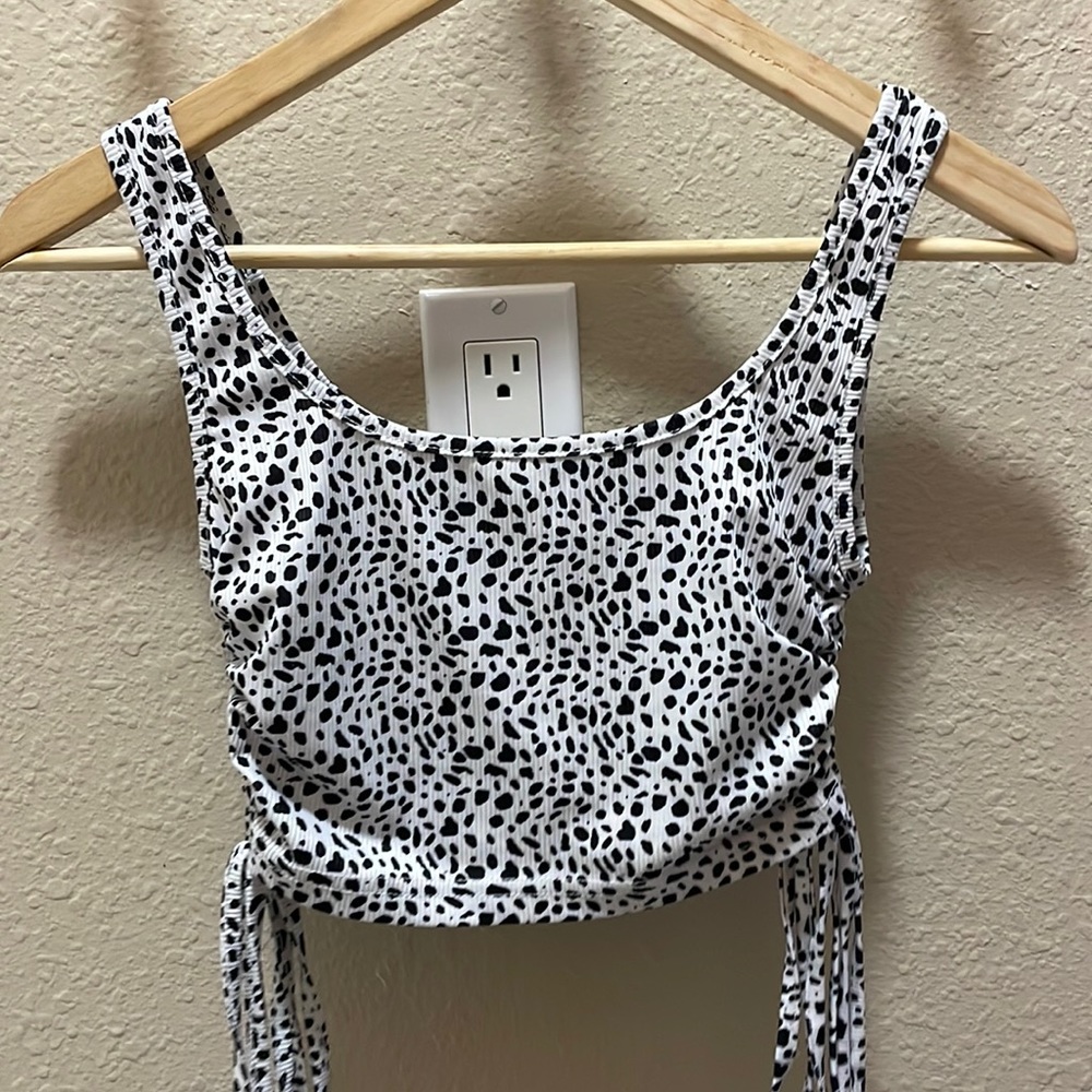 white top with black dots